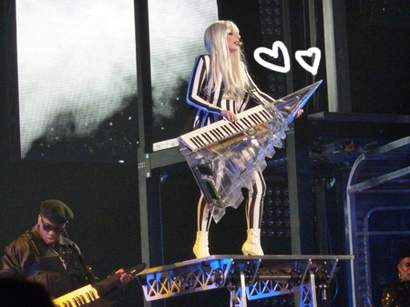  here's a pic of Lady Gaga playing a weird keytar (it appears the actual 
